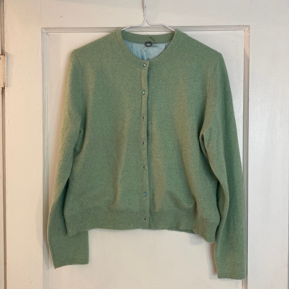 Mint green cashmere cardigan with turquoise silk lining.